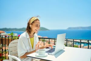 Two in five UK workers continue checking emails on holiday, with top earners working up to three days