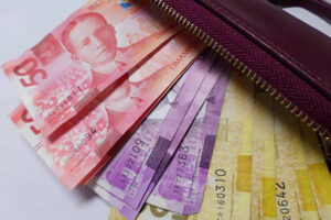 Peso sinks to two-week low before US data