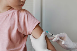 Vaccinating school-age children to prevent outbreaks