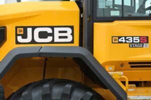 JCB boosts profits despite global market downturn