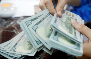 Dollar reserves hit record $112 billion