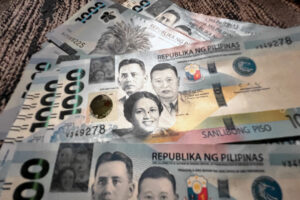 Peso inches down on Middle East conflict