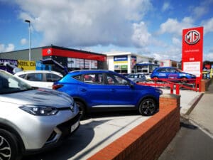 Used car sales climb as consumers shy away from new vehicles