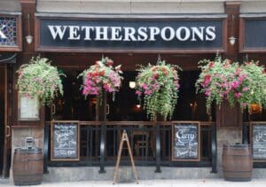 Wetherspoons warns of pint price rise as budget adds £60m in costs